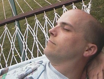 lazy in a hammock in July 2002