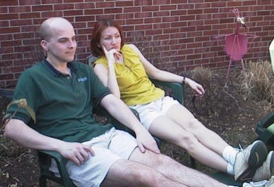 Brett and Elena watching a backyard concert