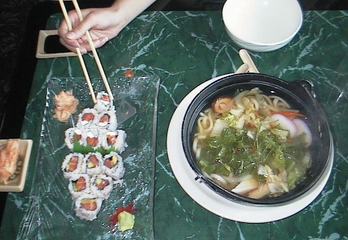 Bobi choosing a sushi roll