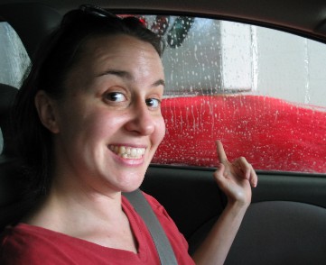 Danielle in the automated car wash at Shell