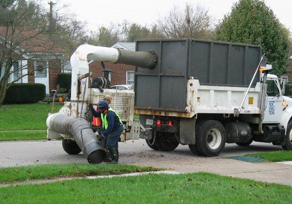 leaf vacuum truck in front of my house