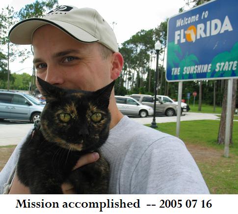 Brett holding cat at FL welcome center