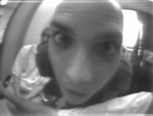 distorted self portrait taken 3 years ago in the jail computer room