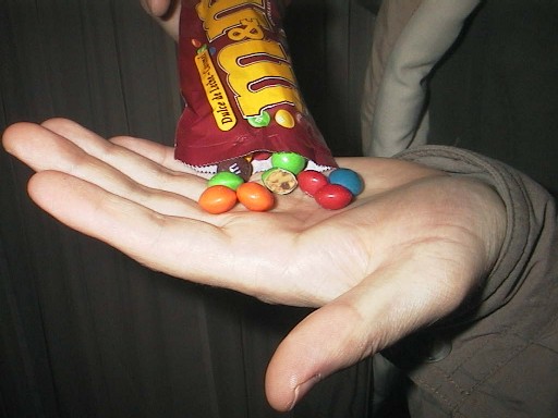 pouring my first dulce de leche M-Ms into my hand