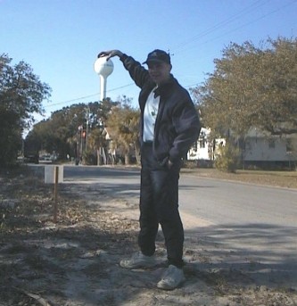 Brett appears to grab the Edisto Beach water tower
