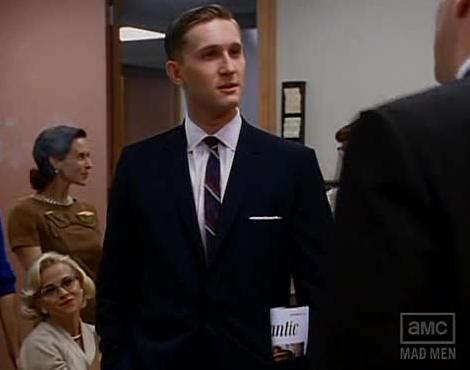 A guy in the Mad Men breakroom